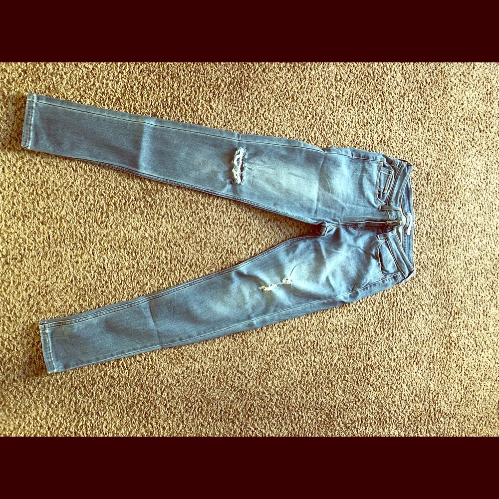 Levi’s 535 distressed denim